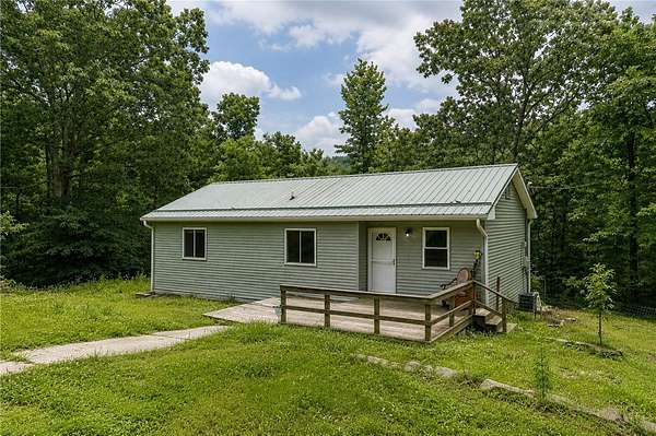 3.25 Acres of Land with Home for Sale in Elkins, Arkansas