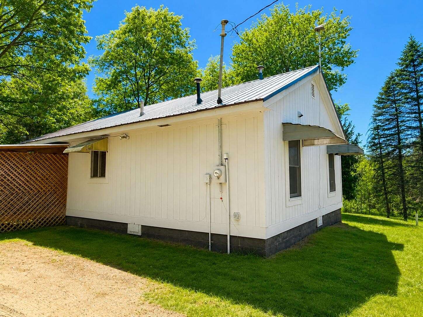 10.1 Acres of Recreational Land with Home for Sale in Hersey, Michigan