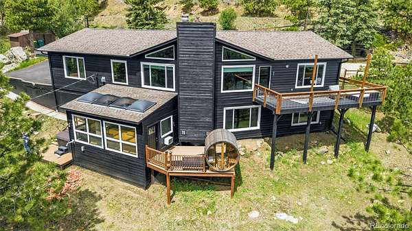 2.3 Acres of Land with Home for Sale in Evergreen, Colorado