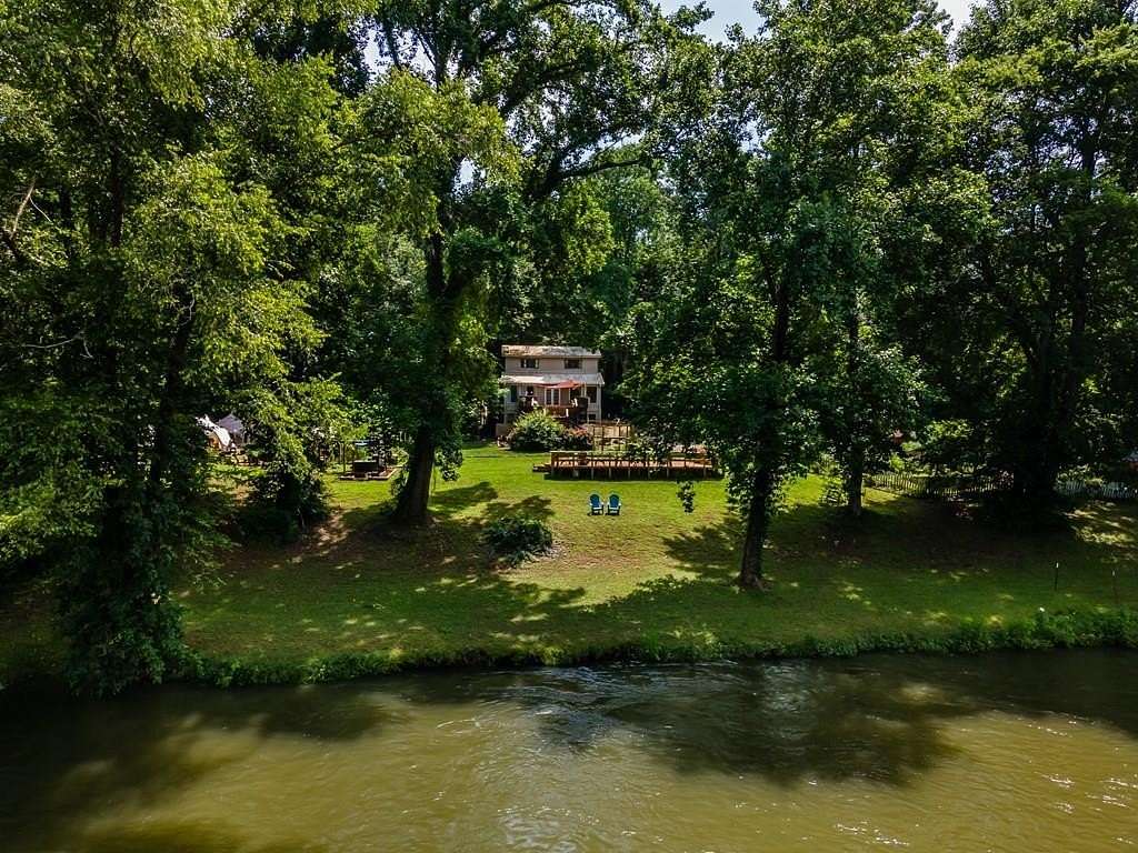 2 Acres of Land with Home for Sale in Benton, Tennessee