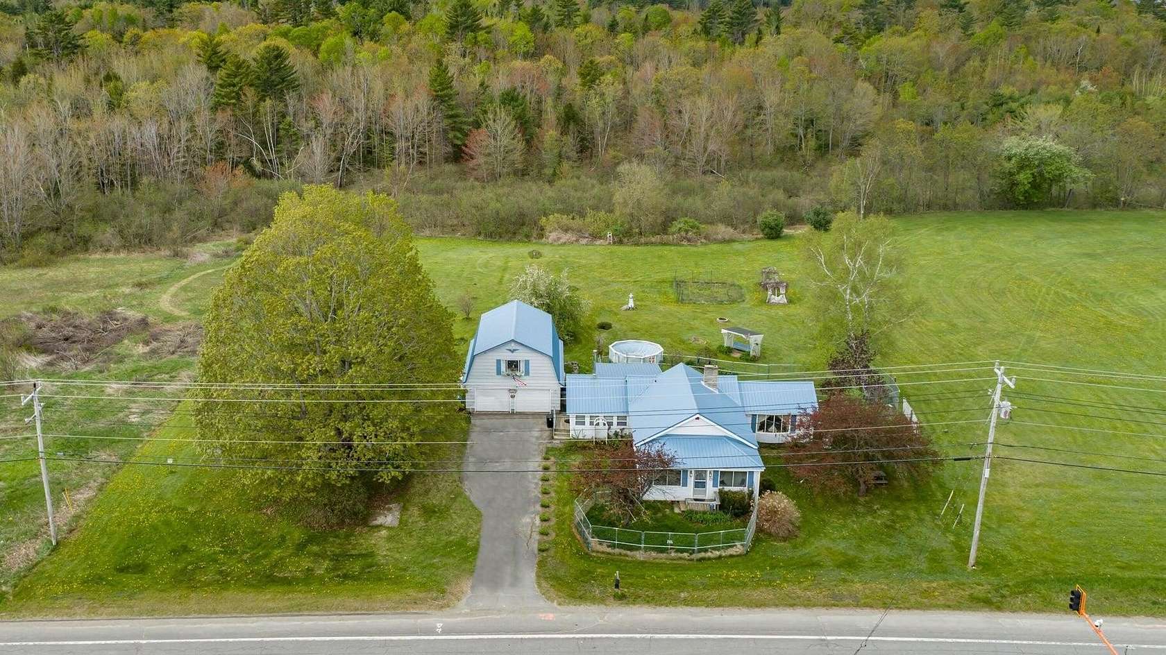 27.8 Acres of Recreational Land with Home for Sale in Milo, Maine