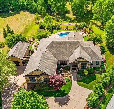 4 Acres of Land with Home for Sale in Summerfield, North Carolina