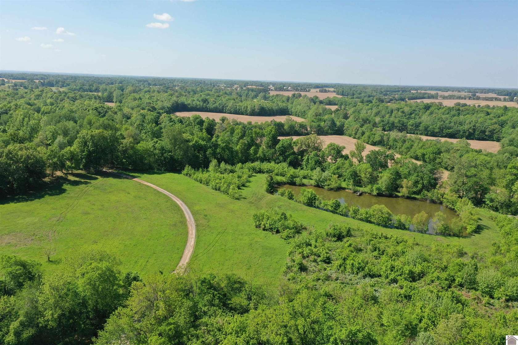 92 Acres of Land with Home for Sale in Kevil, Kentucky