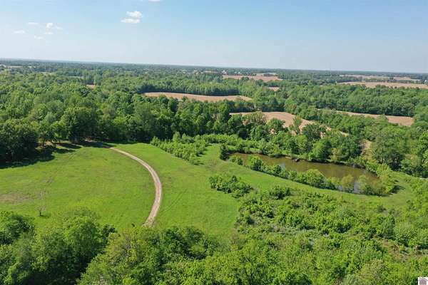 92 Acres of Agricultural Land with Home for Sale in Kevil, Kentucky