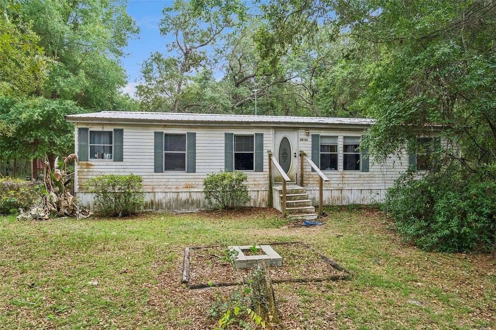 3 Acres of Land with Home for Sale in Umatilla, Florida