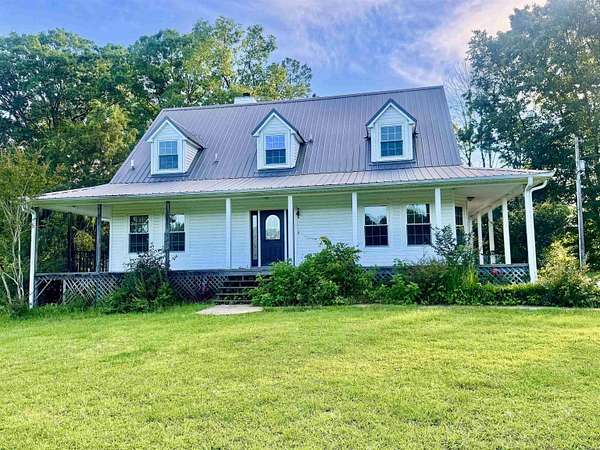 9.7 Acres of Land with Home for Sale in Sheridan, Arkansas