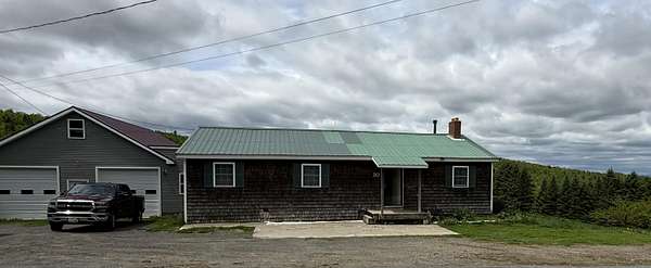 8 Acres of Land with Home for Sale in Dixmont, Maine