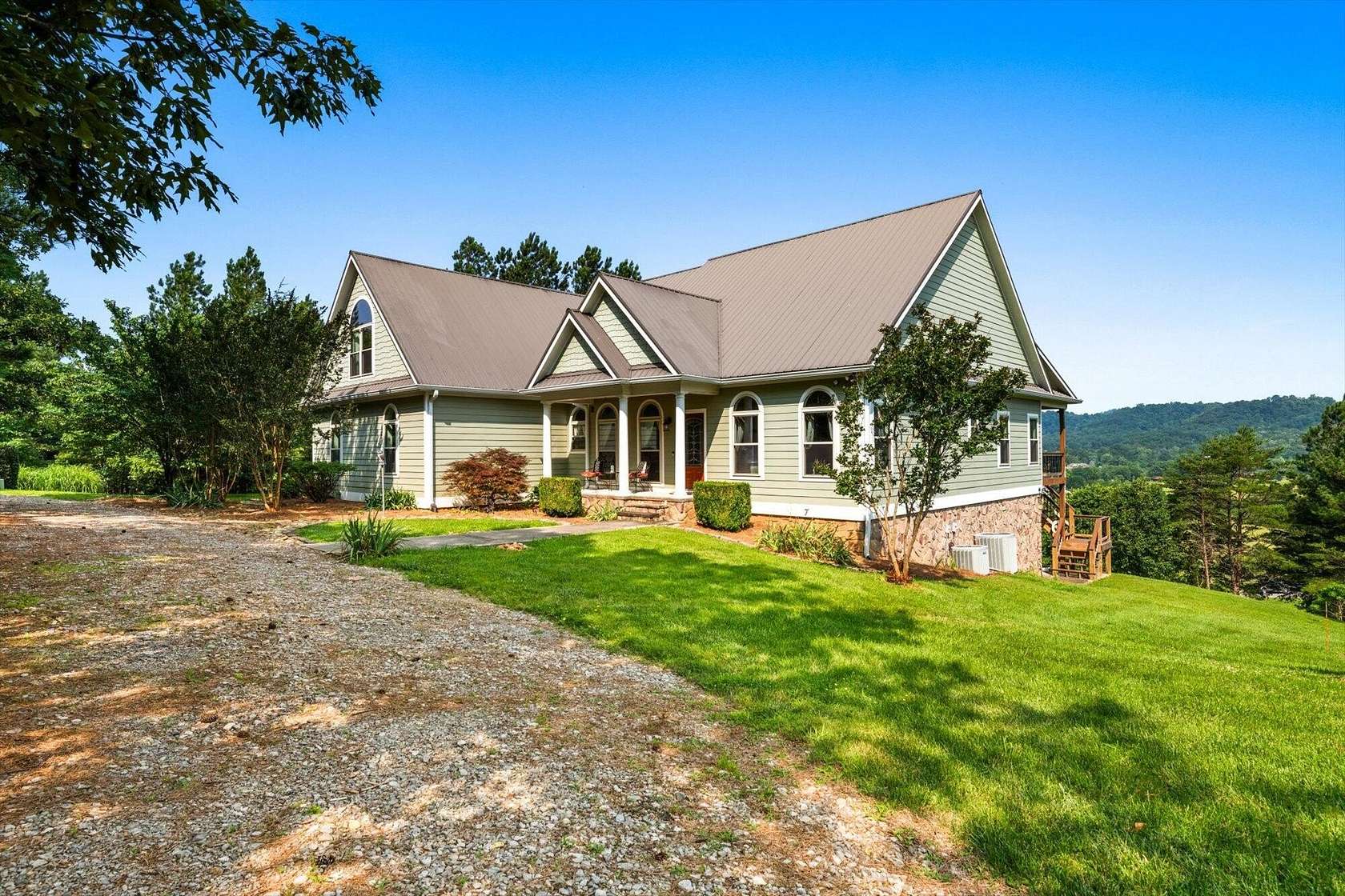 4.89 Acres of Land with Home for Sale in Englewood, Tennessee