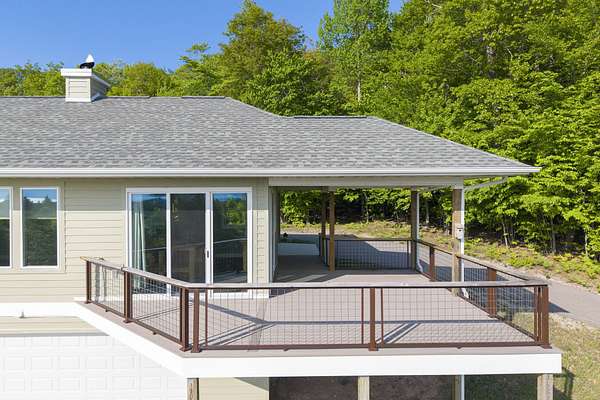 3 Acres of Land with Home for Sale in Onekama, Michigan