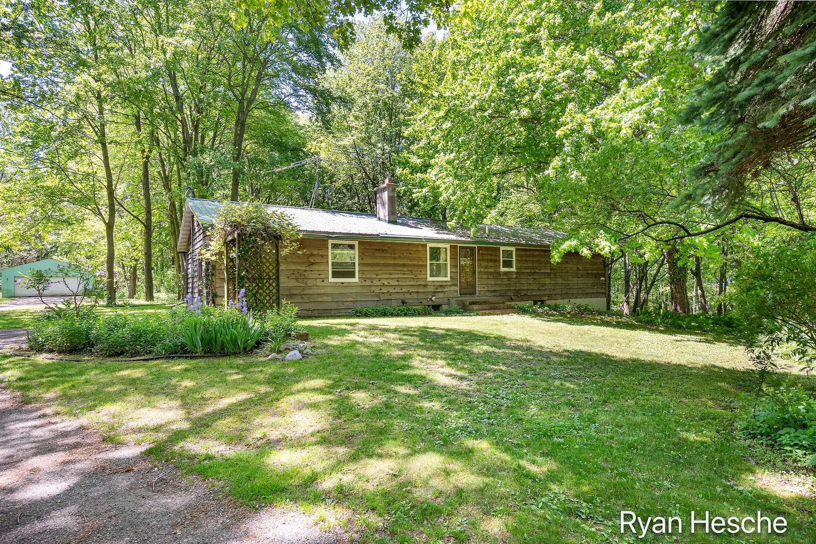 5 Acres of Land with Home for Sale in Saranac, Michigan