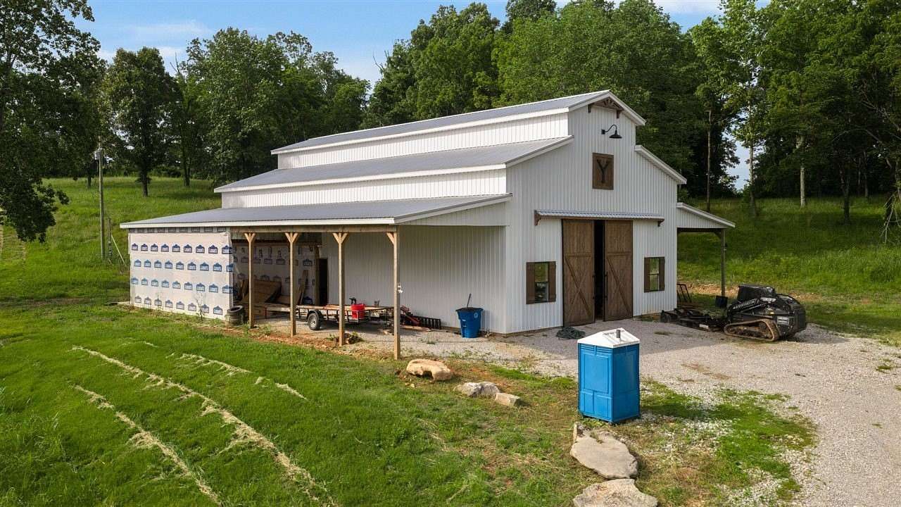 57.9 Acres of Land with Home for Sale in Glasgow, Kentucky