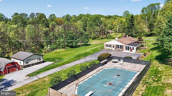 4.7 Acres of Land with Home for Auction in Honey Brook, Pennsylvania