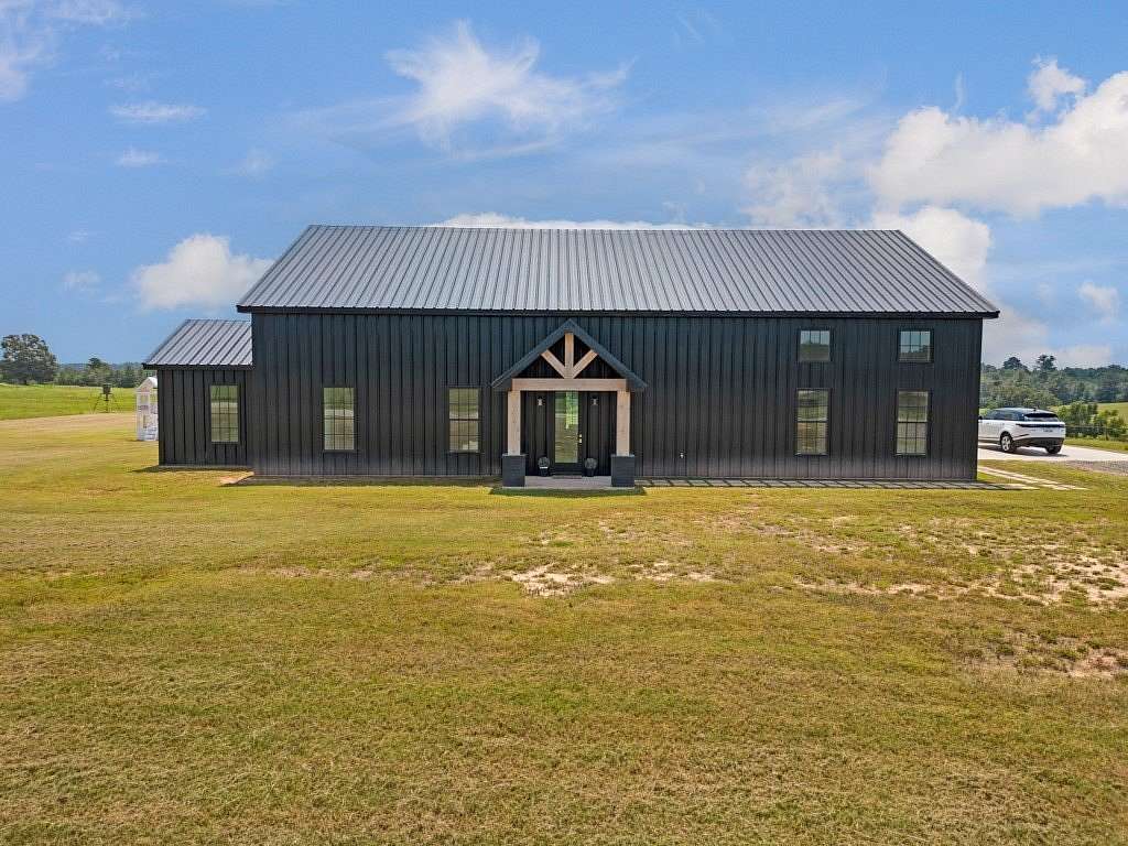 32.5 Acres of Land with Home for Sale in Ore City, Texas