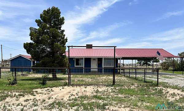 4.8 Acres of Land with Home for Sale in Artesia, New Mexico