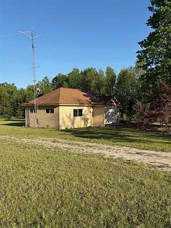 3 Acres of Land with Home for Sale in Joyfield Township, Michigan