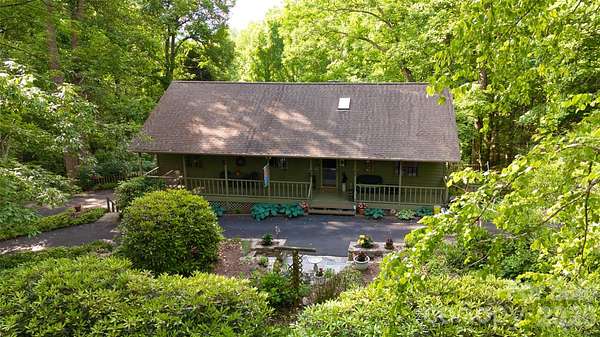 1.82 Acres of Land with Home for Sale in Horse Shoe, North Carolina
