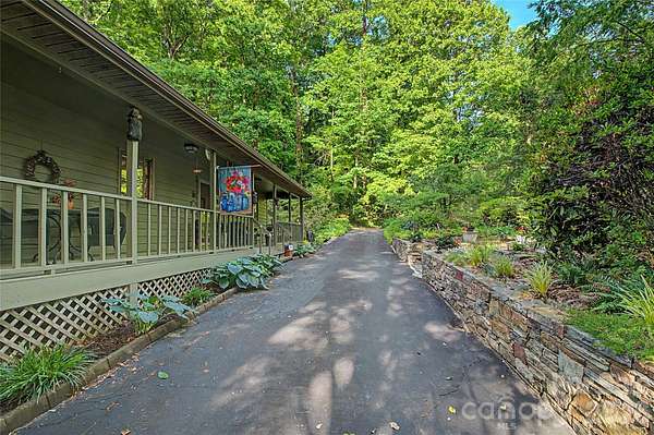1.82 Acres of Land with Home for Sale in Horse Shoe, North Carolina