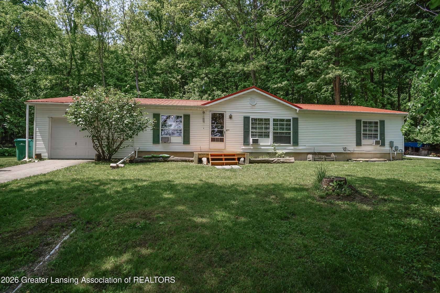 10 Acres of Land with Home for Sale in Charlotte, Michigan