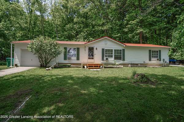 10 Acres of Land with Home for Sale in Charlotte, Michigan