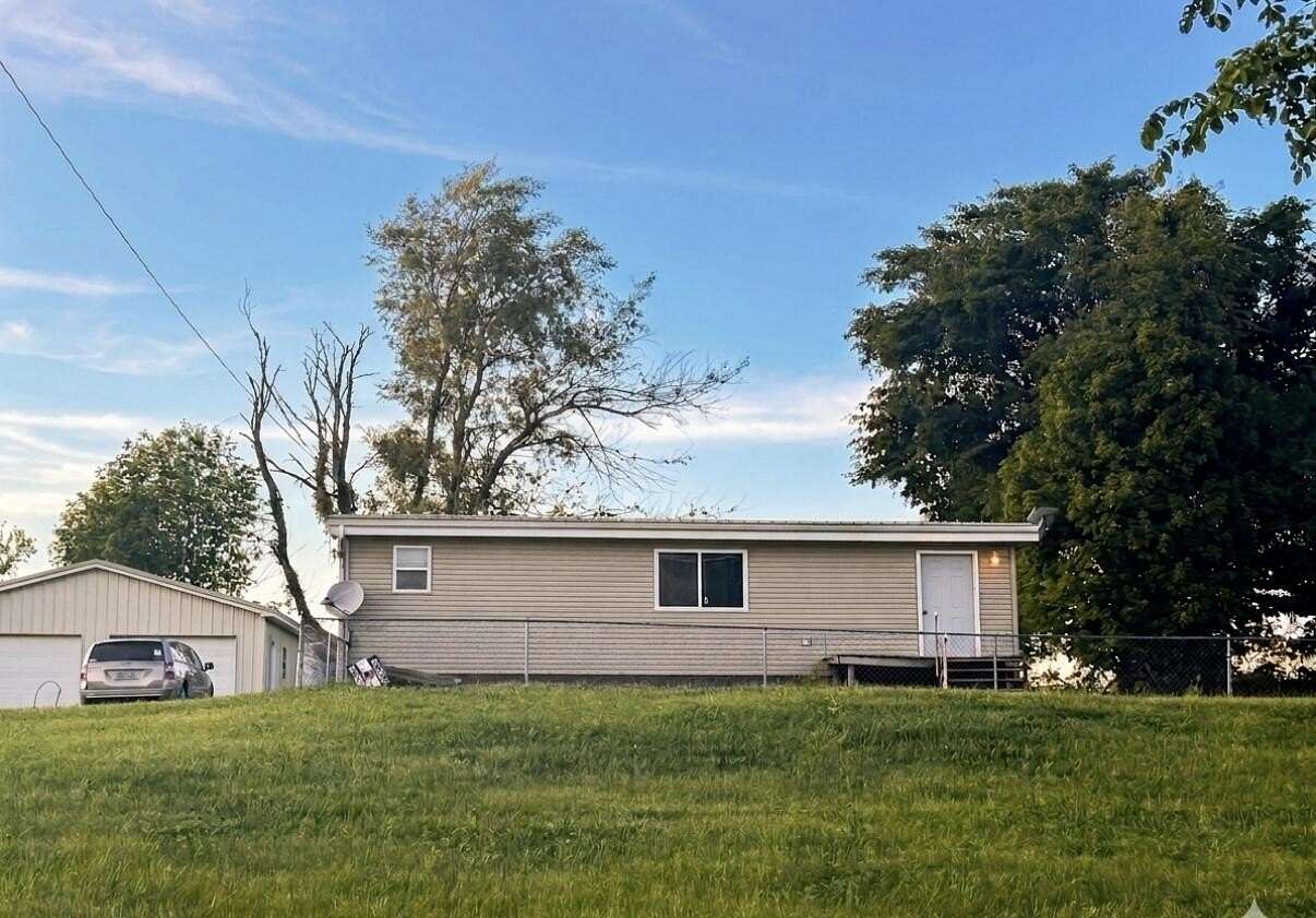 2 Acres of Land with Home for Sale in Hudson, Michigan