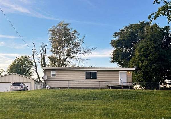 2 Acres of Land with Home for Sale in Hudson, Michigan