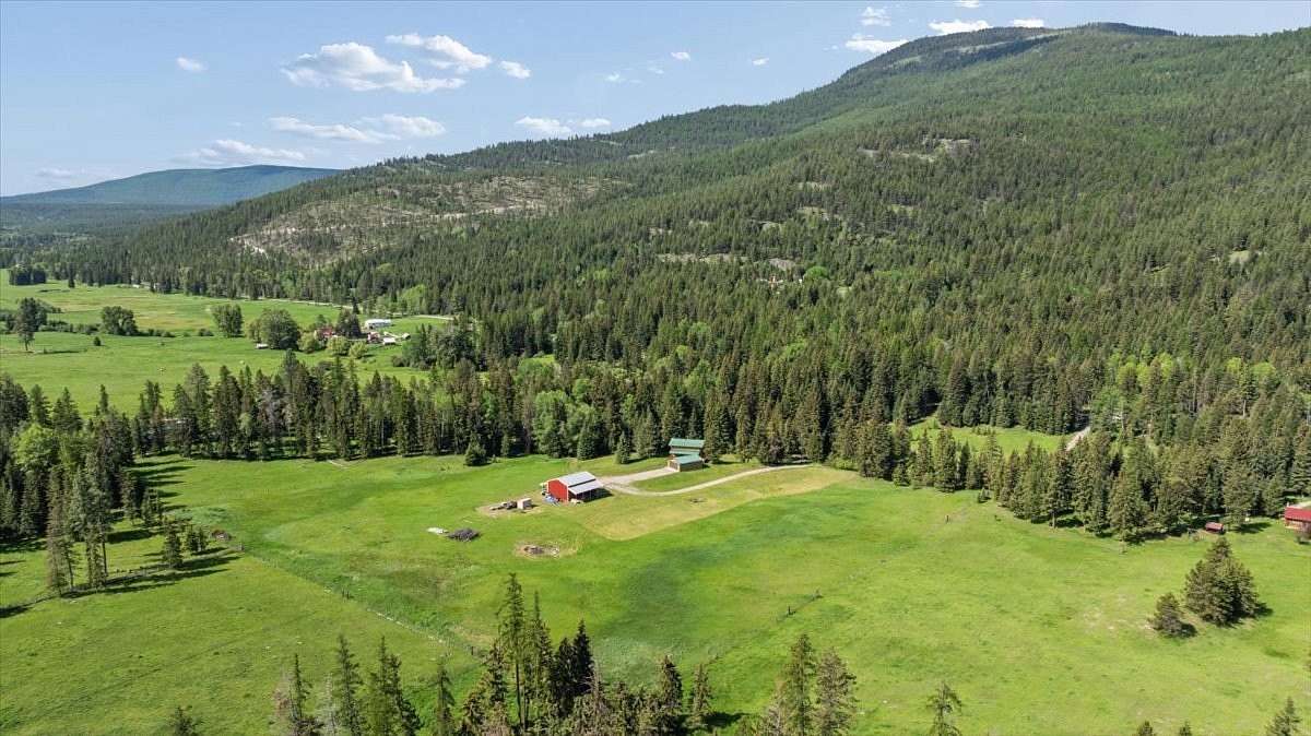 12.2 Acres of Recreational Land with Home for Sale in Kila, Montana