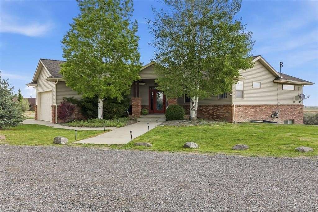 11.2 Acres of Land with Home for Sale in Powell, Wyoming
