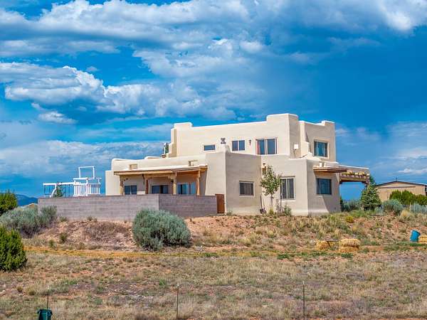 13.7 Acres of Land with Home for Sale in Santa Fe, New Mexico