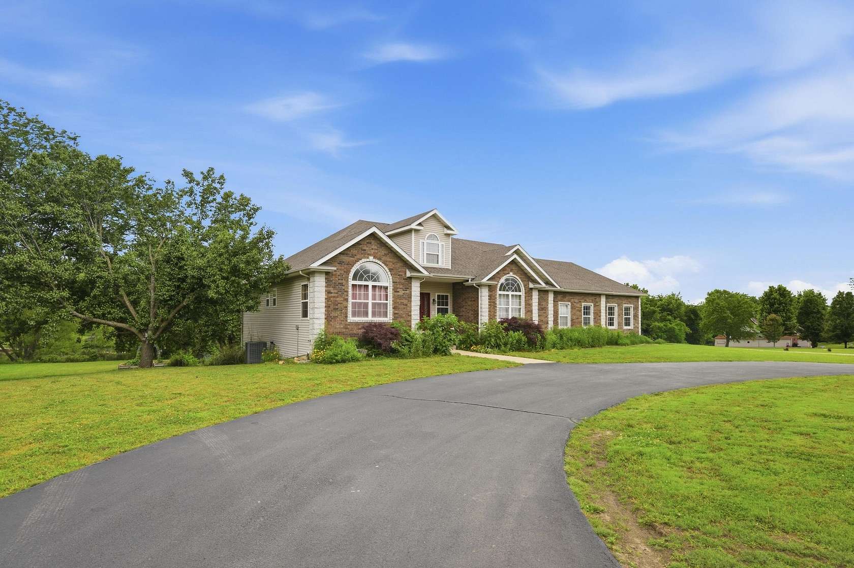 2.42 Acres of Land with Home for Sale in Carthage, Missouri