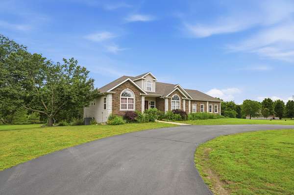 2.42 Acres of Land with Home for Sale in Carthage, Missouri