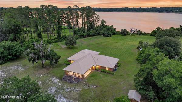 12.8 Acres of Land with Home for Sale in Pomona Park, Florida