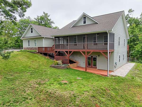 9.16 Acres of Land with Home for Sale in Warne, North Carolina