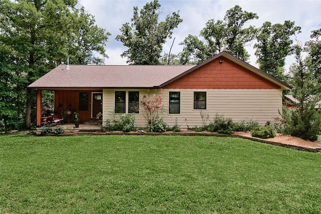 4.13 Acres of Land with Home for Sale in Gravette, Arkansas