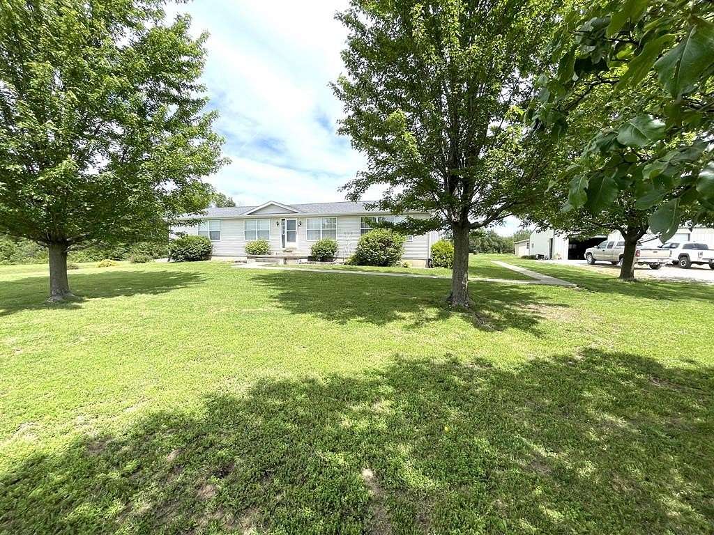 5.3 Acres of Land with Home for Sale in Excello, Missouri