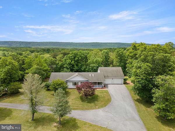 10.7 Acres of Land with Home for Sale in Hedgesville, West Virginia