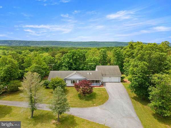 10.7 Acres of Land with Home for Sale in Hedgesville, West Virginia