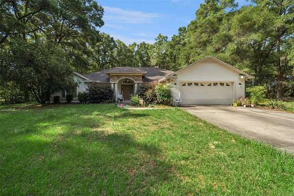 3 Acres of Land with Home for Sale in Morriston, Florida