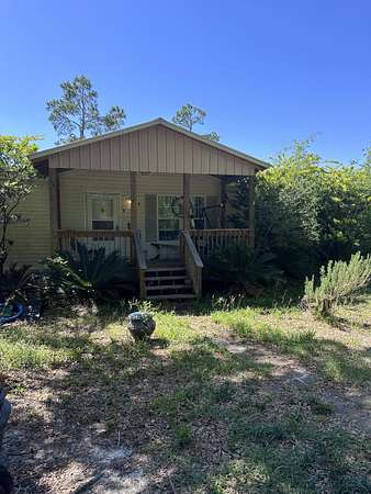 5 Acres of Land with Home for Sale in Frostproof, Florida