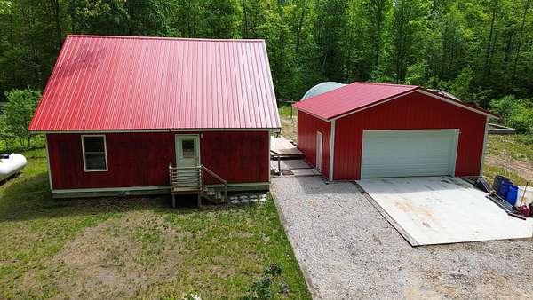 10 Acres of Land with Home for Sale in White Cloud, Michigan
