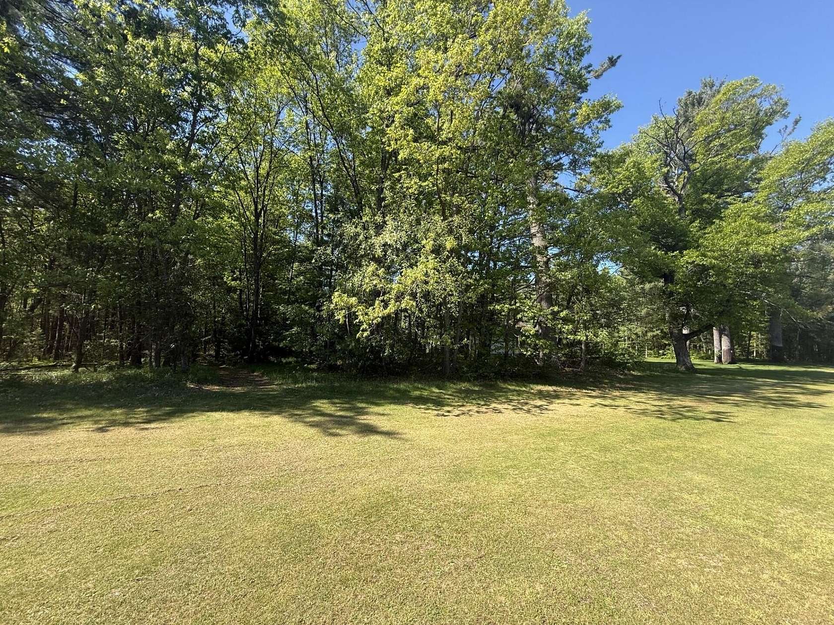 0.58 Acres of Land for Sale in Prudenville, Michigan