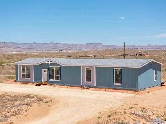 4.85 Acres of Land with Home for Sale in Big Water, Utah