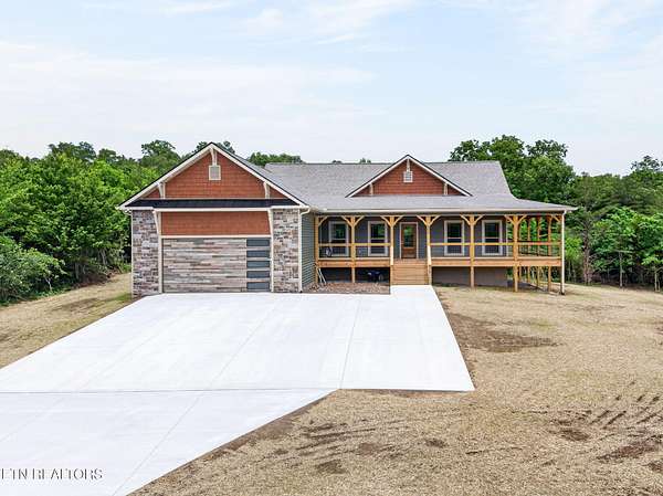 7.1 Acres of Land with Home for Sale in Crab Orchard, Tennessee