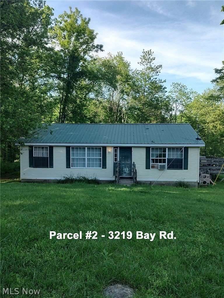 5.1 Acres of Land with Home for Auction in Carrollton, Ohio