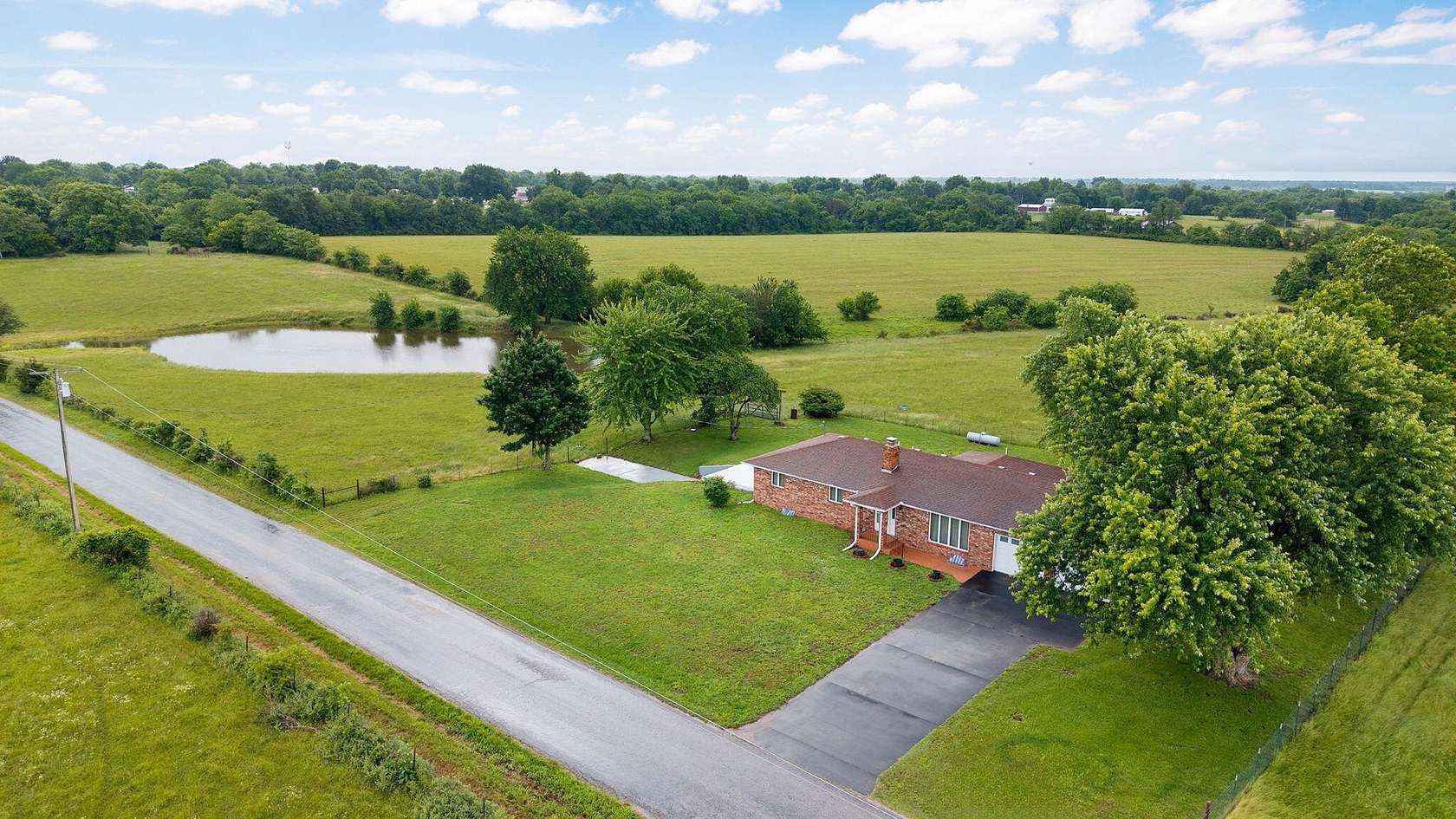 5.43 Acres of Land with Home for Sale in Miller, Missouri