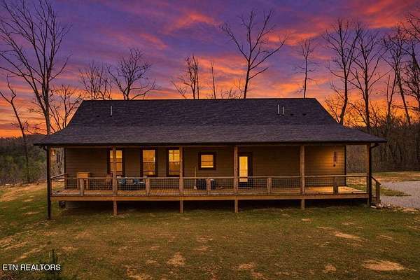 7.38 Acres of Land with Home for Sale in Lancing, Tennessee