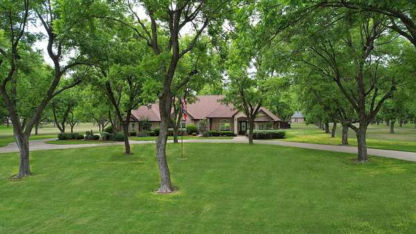2.89 Acres of Land with Home for Sale in Granbury, Texas