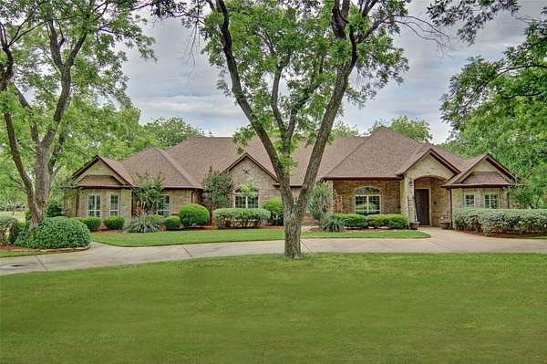 2.89 Acres of Land with Home for Sale in Granbury, Texas