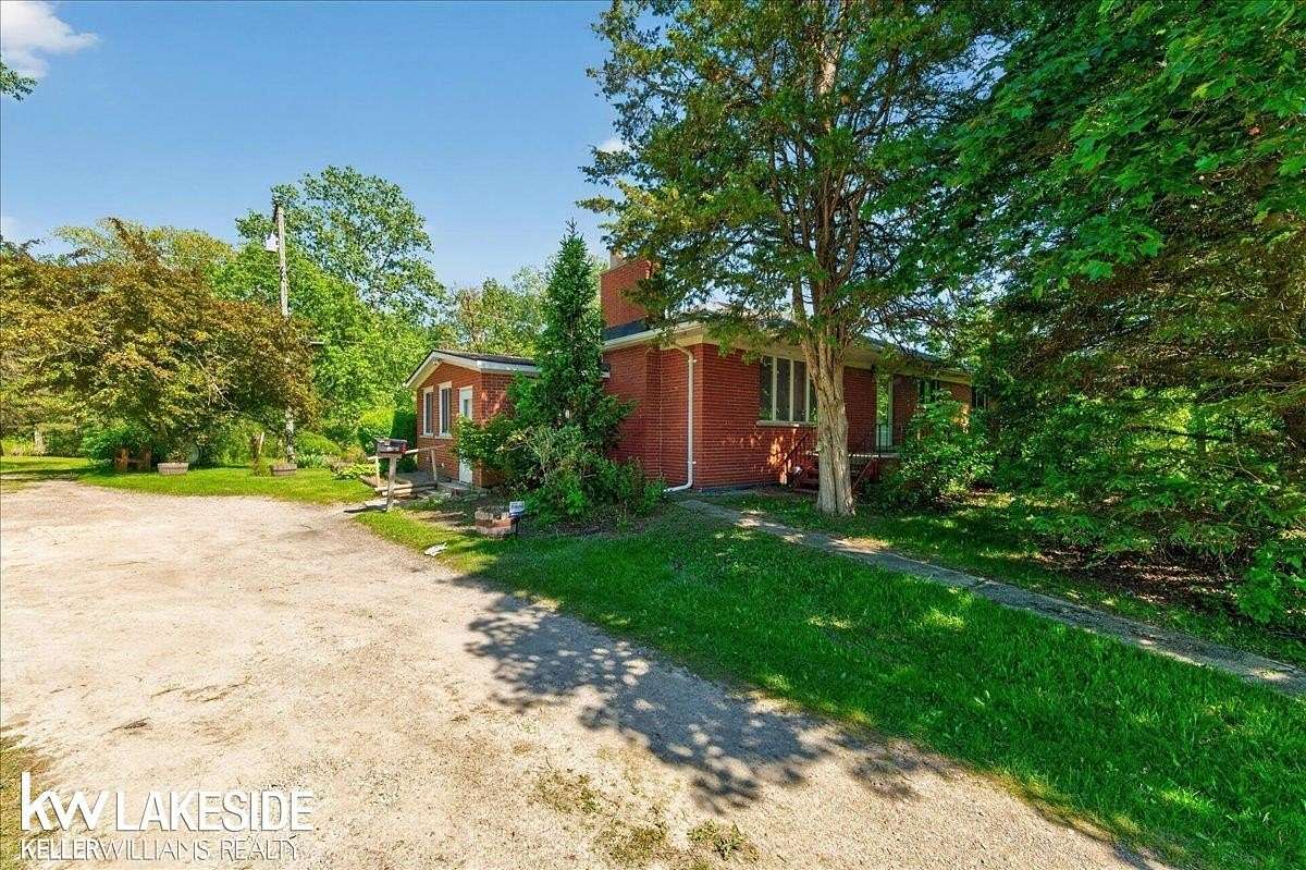 12.9 Acres of Land with Home for Sale in Ray Township, Michigan