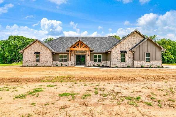 2 Acres of Land with Home for Sale in Blossom, Texas