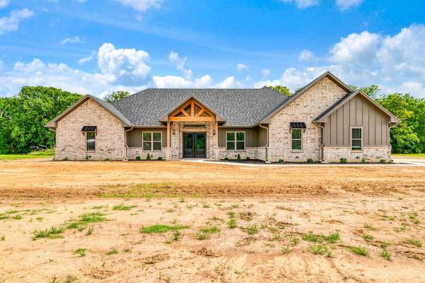 2 Acres of Land with Home for Sale in Blossom, Texas